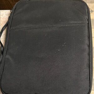 Black iPad zippered carrying case.